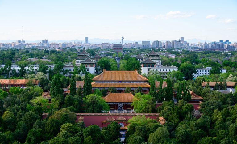 Asia’s Startup Funding Nears Record High as AI Takes 55% 2 Traditional rooftops and Beijing skyline